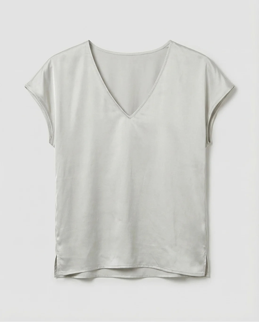 Blusa escote pico con lazada lateral